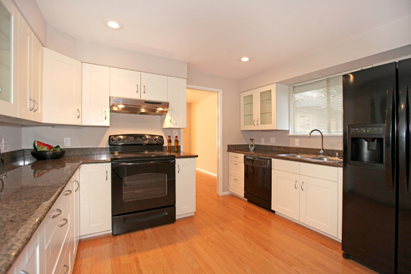 White Kitchen Black Appliances add value to your home with 5 kitchen and bathroom projects White Kitchen Black Appliances add value to your home with 5 kitchen and bathroom projects